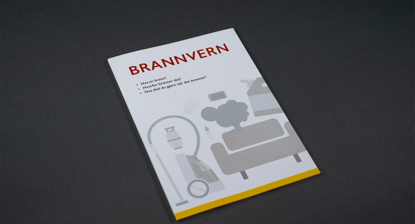 Bildet viser en bok med tittelen "Brannvern". Den er hvit, med en gul stripe nederst, og har illustrasjon av en støvsuger og sofa